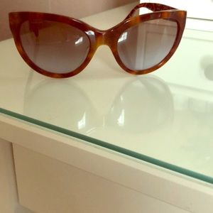 Brown tortoise cat eye Prada sunglasses